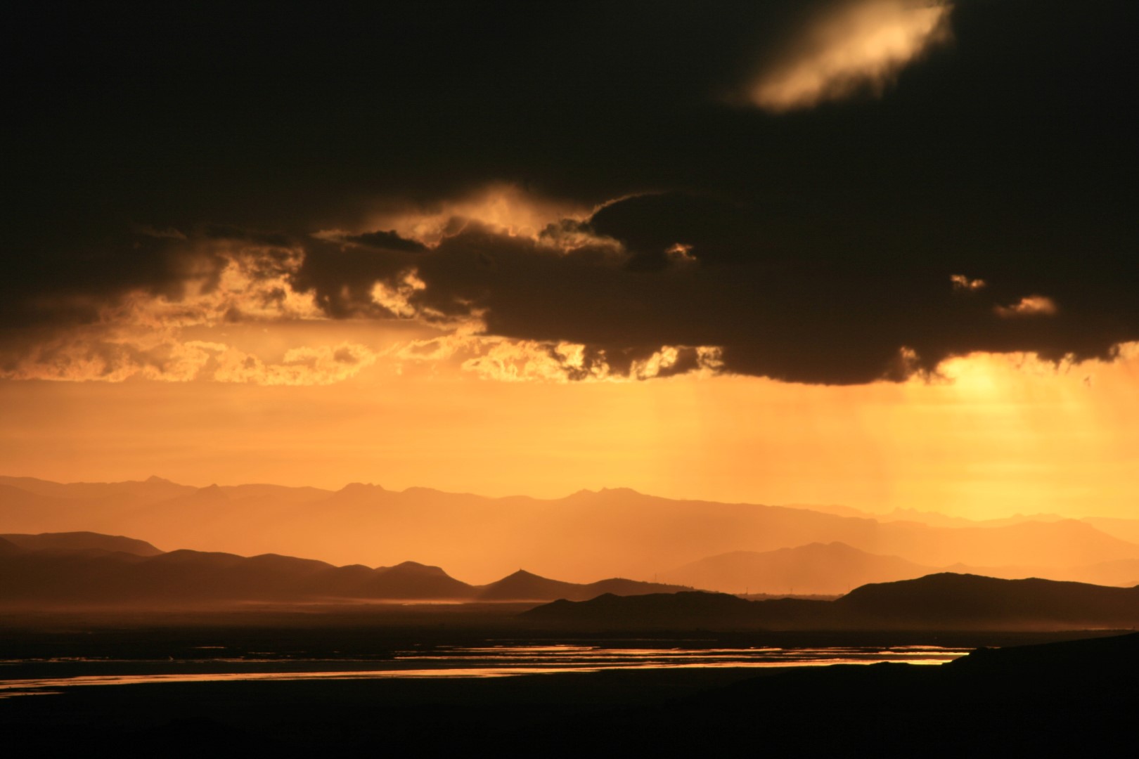 zonsondergang bolovia bergen titicaca meer amantani eiland peru rondreis